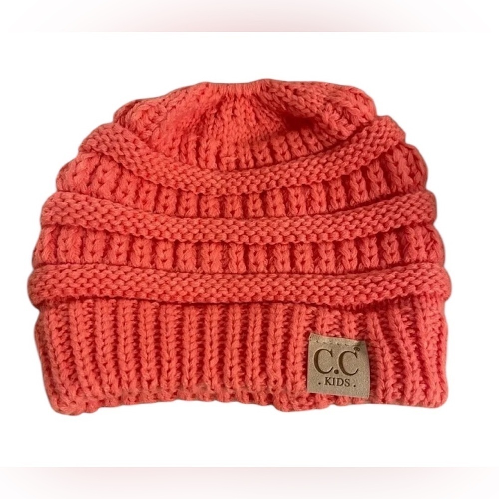 C.C. Children’s knit hat with ponytail hole. Pink/Salmon color